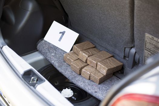 Cocaine packages in the trunk of a car