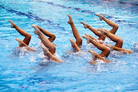 Synchronized swimmers legs movement