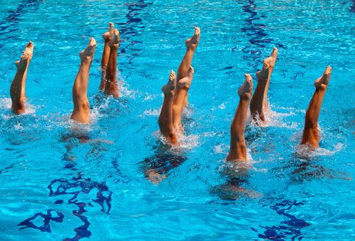 Synchronized swimmers legs movement