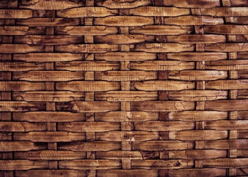 Wooden grid background of braided wood