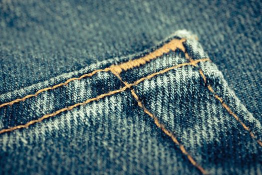 Blue denim jeans texture with thread