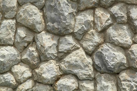 Texture of stone wall with for background