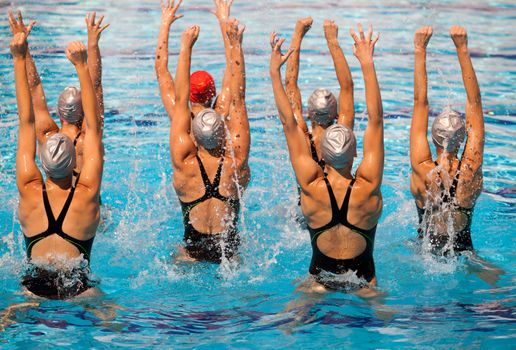 Synchronized swimmers legs movement