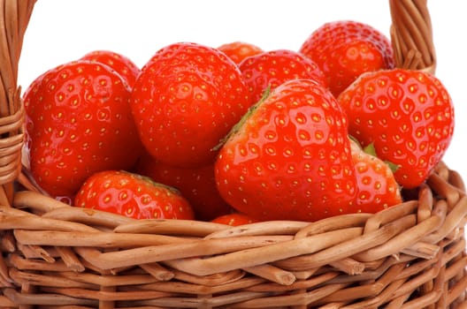 Perfect Fresh Ripe Strawberries on Edge of Wicker Basket closeup on white background