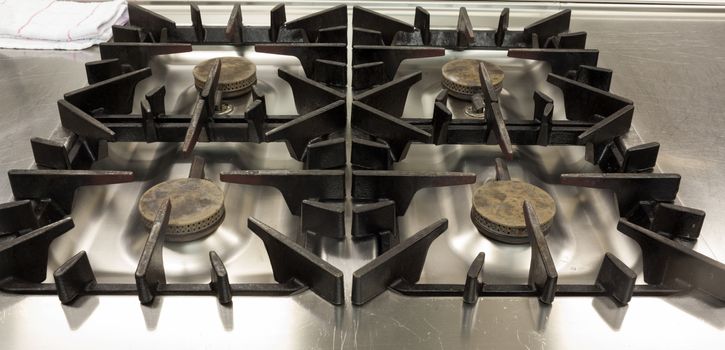 Picture of gas stove in professional kitchen