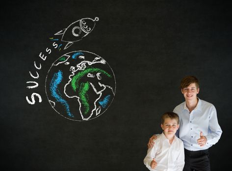 Thumbs up boy dressed up as business man with teacher man and chalk globe and jet world travel on blackboard background
