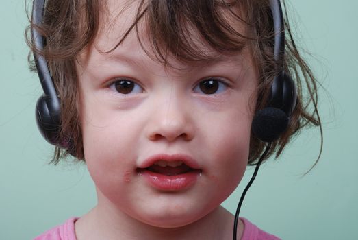 Girl listening to with headphones