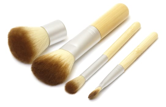 Makeup brushes on white background