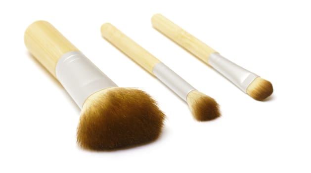 Makeup brushes on white background