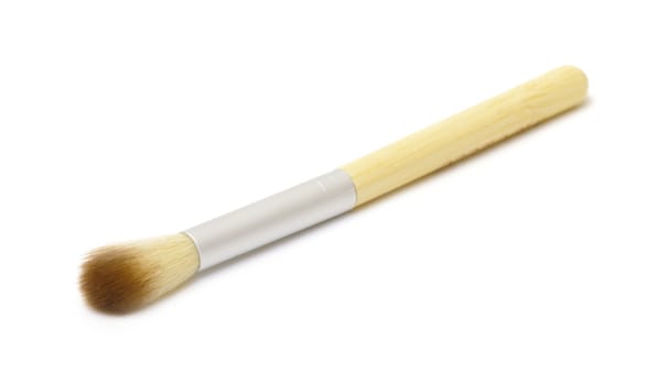 Makeup brush on white background