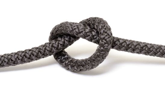 Black rope knot on white background