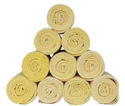 Rolled up spa towels on white