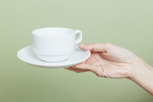 cup of tea or coffee in hand