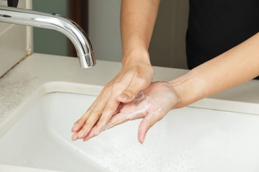 Washing hands with soap