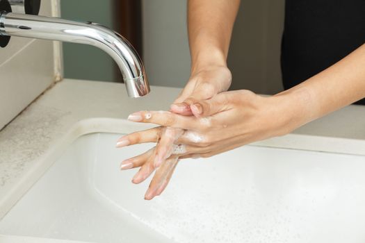 Washing hands with soap