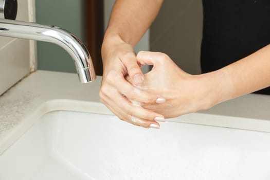 Washing hands with soap