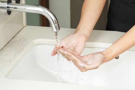Washing hands with soap
