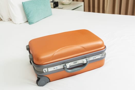 business suitcase on bed for traveling