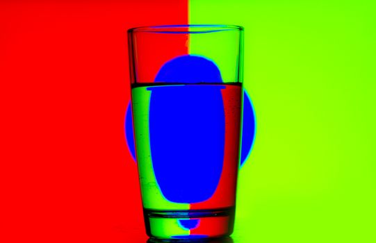 Reflection of Red green blue on a cup of water
