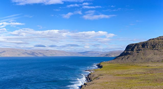 Iceland summer landscape. Fjord and mountains. Panorama.