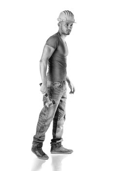 Full body shot of construction worker with hard hat and hammer, isolated on white