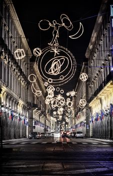 Via Roma in Turin city center (Italy) at night lit up by Christmas lights