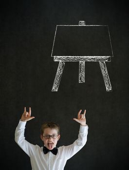 Knowledge rocks boy dressed up as business man with learn art chalk easel on blackboard background