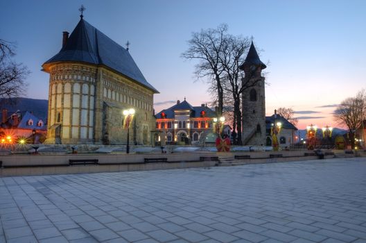 City square in Piatra Neamt: Royal Court  with Stephen the Great Church and Tower