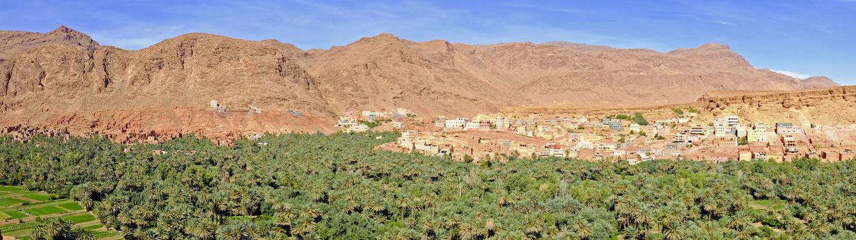 Panorama with oasis and village in the desert in Morocco Africa