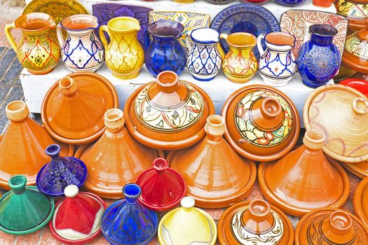 Colorful Tajines for sale in a market stall