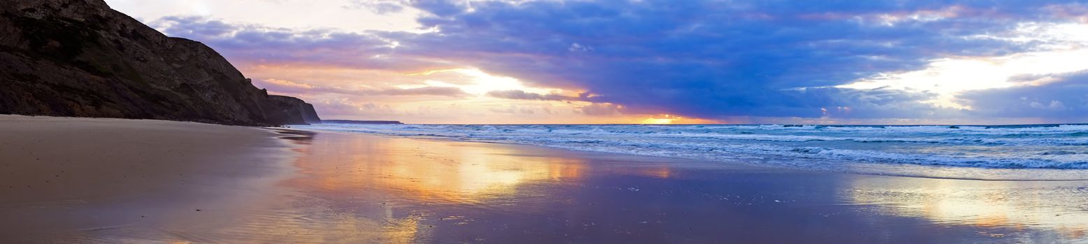 Panorama from a beautiful sunset at the atlantic ocean in Portugal