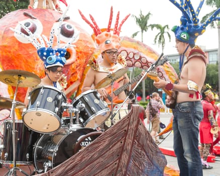 Costumed revelers march with floats in the annual Dream Parade on October 19, 2013, in Taipei, Taiwan.