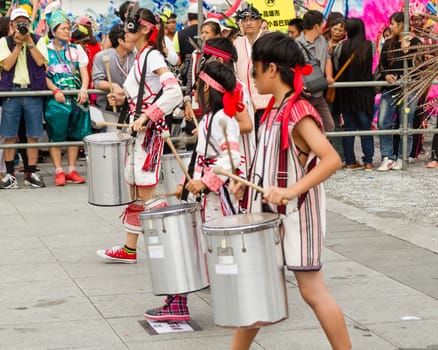 Costumed revelers march with floats in the annual Dream Parade on October 19, 2013, in Taipei, Taiwan.