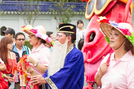 Costumed revelers march with floats in the annual Dream Parade on October 19, 2013, in Taipei, Taiwan.