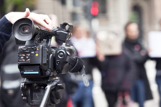 Covering a street protest using video camera