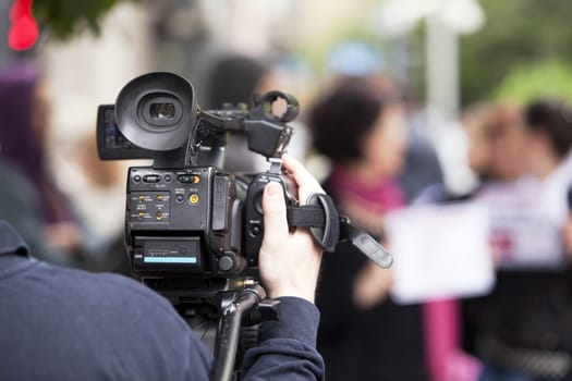 Covering a street protest using video camera