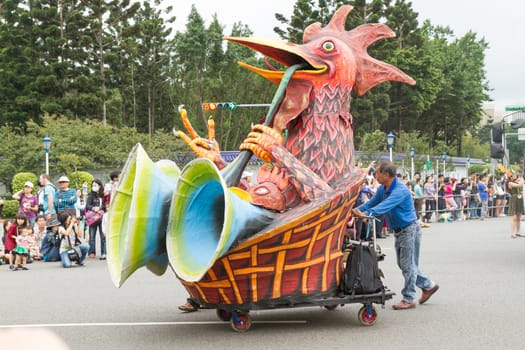 Costumed revelers march with floats in the annual Dream Parade on October 19, 2013, in Taipei, Taiwan.