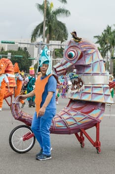 Costumed revelers march with floats in the annual Dream Parade on October 19, 2013, in Taipei, Taiwan.