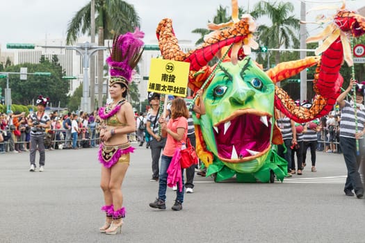 Costumed revelers march with floats in the annual Dream Parade on October 19, 2013, in Taipei, Taiwan.