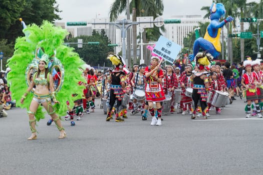 Costumed revelers march with floats in the annual Dream Parade on October 19, 2013, in Taipei, Taiwan.