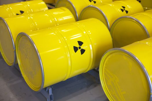 Yellow barrels with radioactive waste disposal