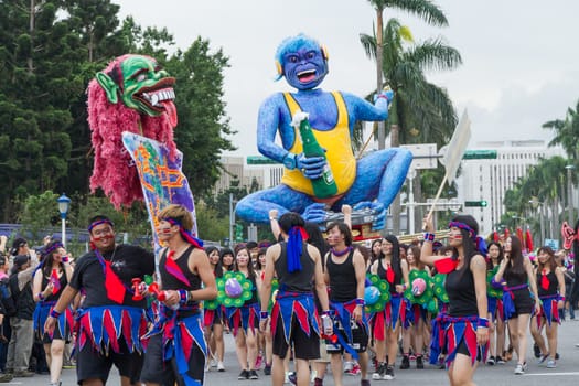 Costumed revelers march with floats in the annual Dream Parade on October 19, 2013, in Taipei, Taiwan.