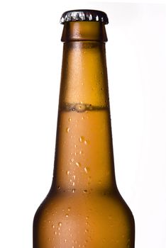 Close up of Cold frosted beer bottle on white background.