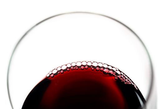 Glass of Red Wine with bubbles isolated on white background