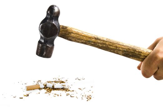 An Isolated Hand Holding a Hammer smashing and a Broken Cigarette on a white backrgound