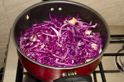 Cooking Sliced Red Cabbage in Cooking Pot