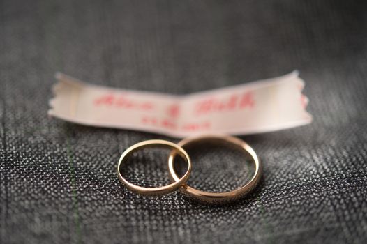 Macro photo with low depth of focus of two wedding rings