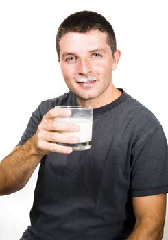 Healthy Young  Man drinking a Glass of Milk isolated on White Background