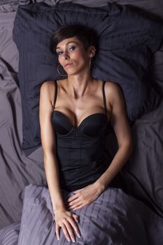 woman in lingery in bed