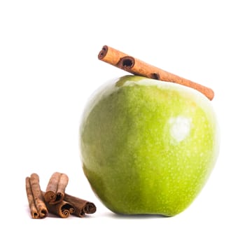 Apple and cinnamon isolated on white background